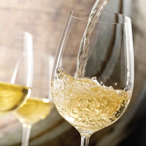 White wine poured into a wine glass